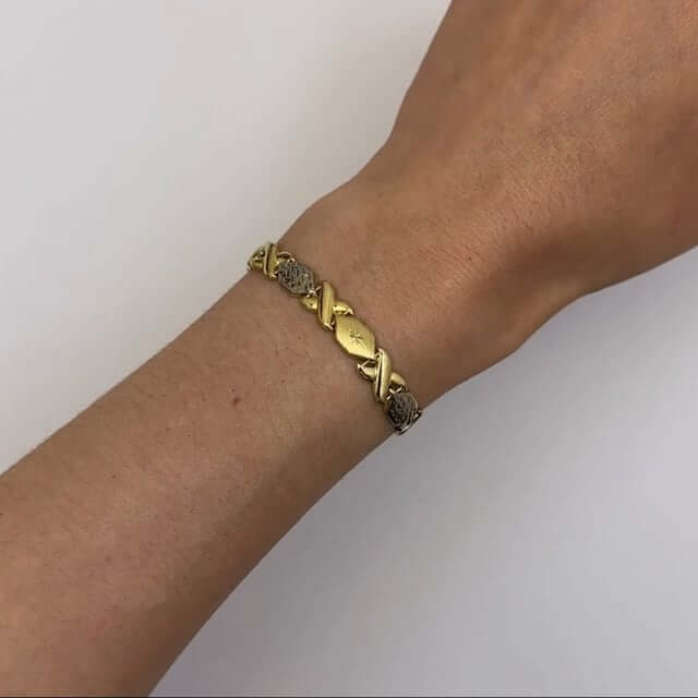 10K Gold Two-Tone Yellow White 7mm Diamond-Cut XO Stampato Bracelet 7.25"