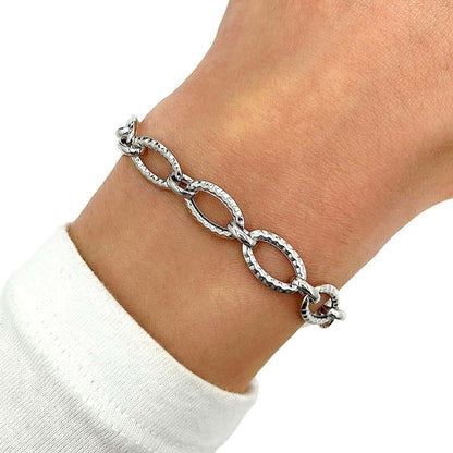 14K Gold Yellow White 8.6mm Twisted Oval Link Bracelet 7.25"