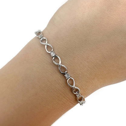 0.03CTW Natural Diamond Infinity Bracelet 7" 5mm - Sterling Silver