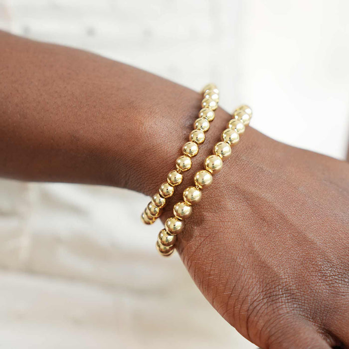 18K Yellow Gold Over Sterling Silver 7mm Graduated Beaded Ball Bracelet (Hollow) 7" - WJD Exclusives