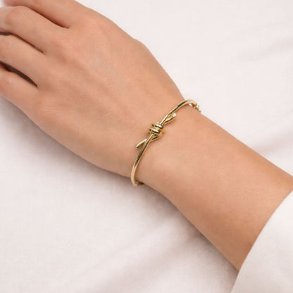 14K Yellow Gold High Polished Knot Round Bangle Bracelet 7"