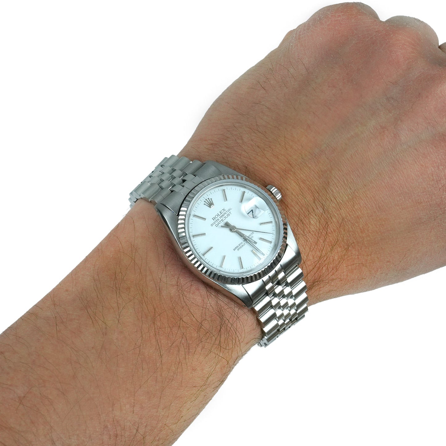 Silver wristwatch on a wrist with a white background [lifestyle]