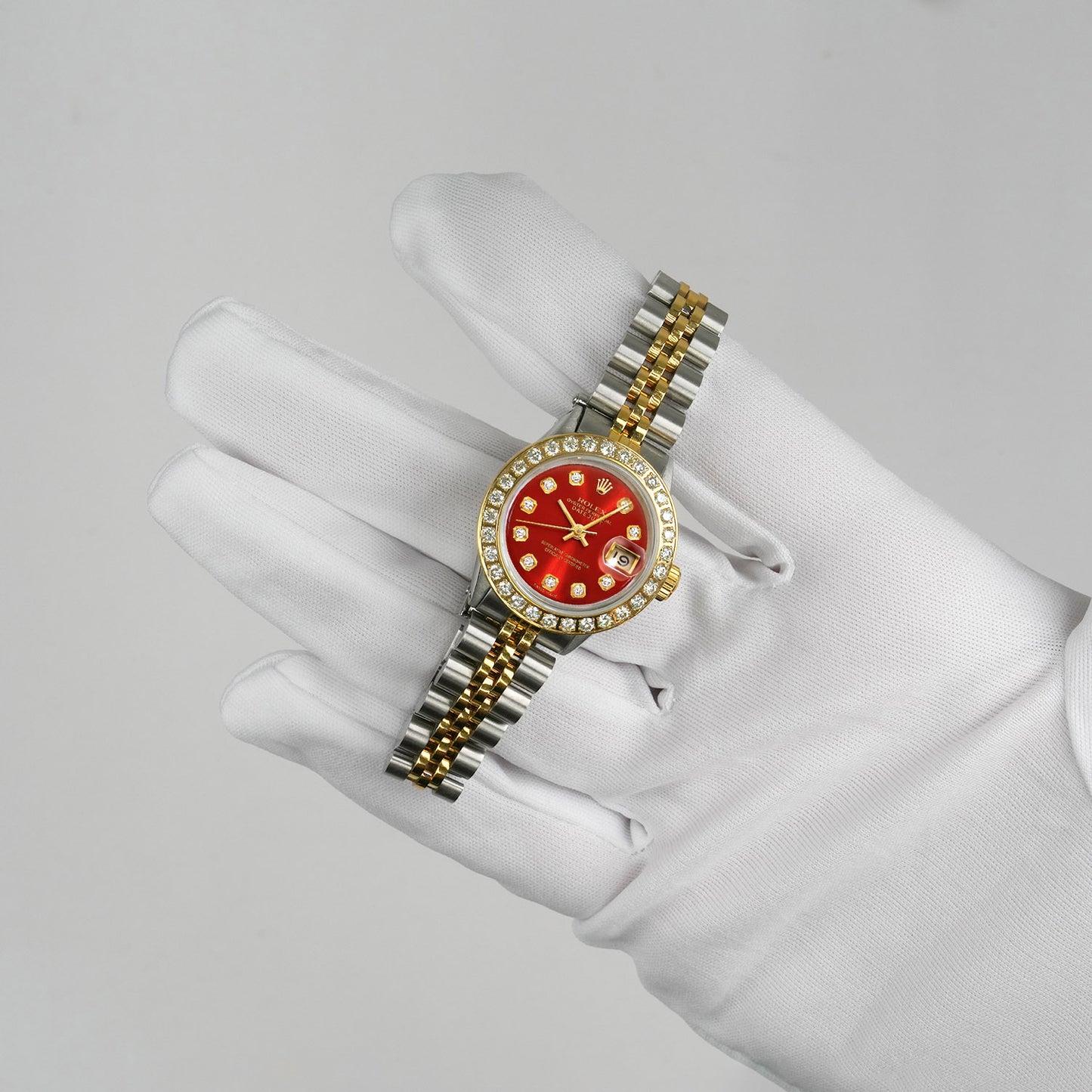 Rolex Datejust 69173 26mm Ruby Dial Diamond Bezel Steel Women's Watch