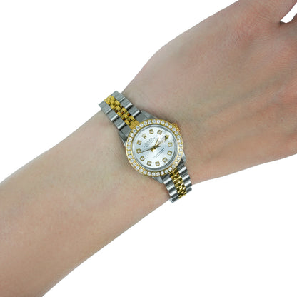 Two-tone watch on a wrist with a white background [lifestyle]