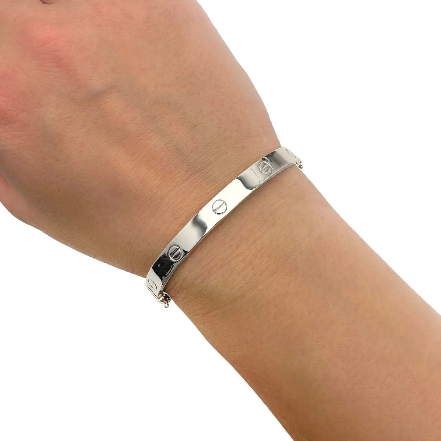 A silver metal bracelet with screw details, shown worn on a person's wrist against a plain white background. [lifestyle]