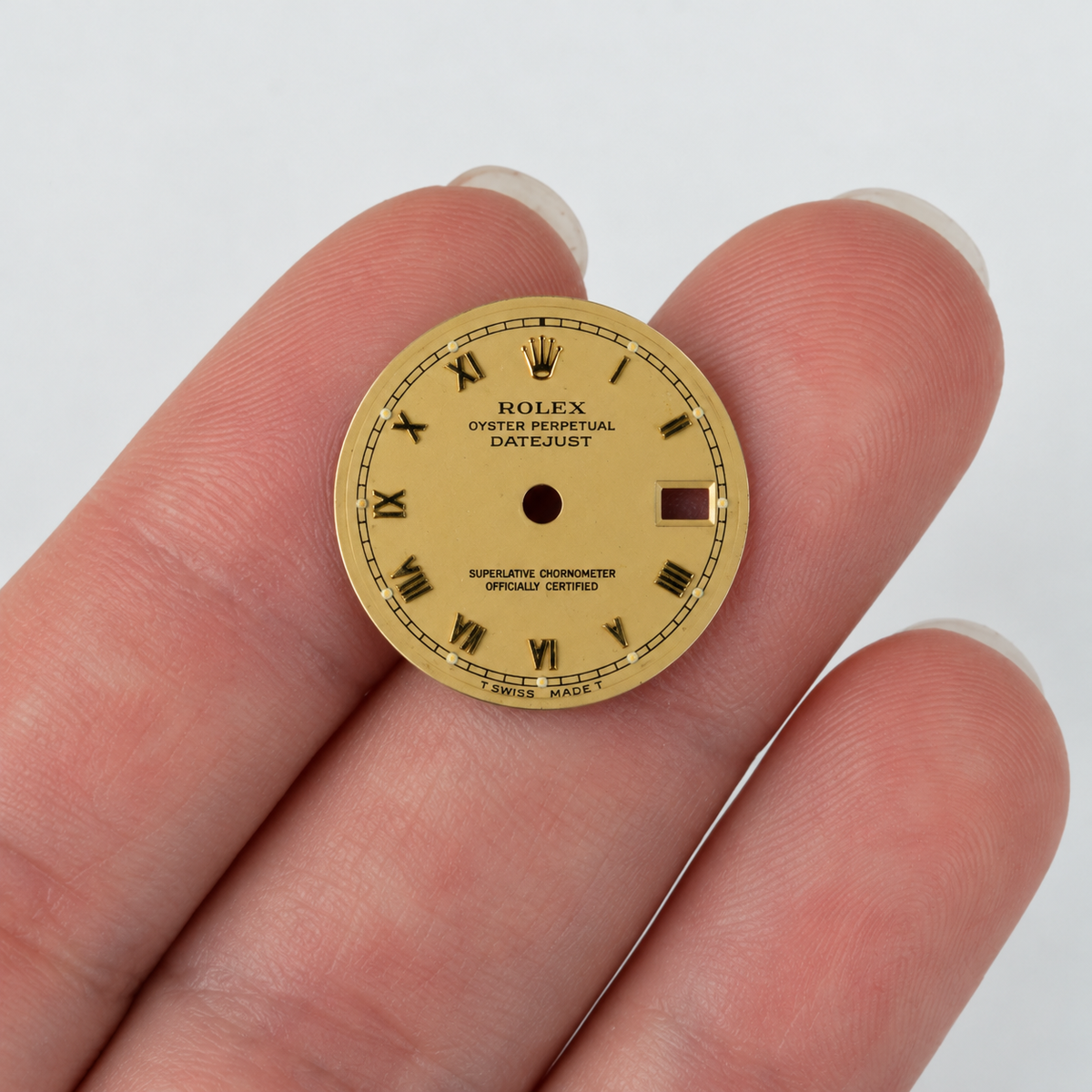 Rolex Datejust 26 dial Style 14272 — resting on fingers [lifestyle]