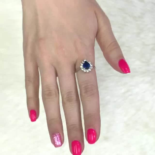 14K Gold White Pear Shaped Sapphire And Zirconia Heart Halo Ring