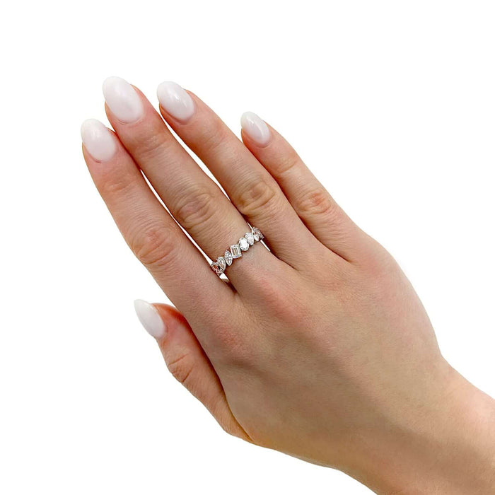 4.66 TCW Lab-Grown Diamond 14K White Gold Eternity Band worn on a hand with manicured nails.
