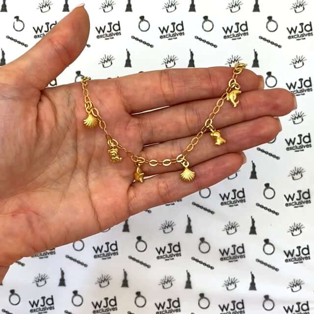 Kids Yellow Gold Over Sterling Silver Dolphin Key Bear Star Seashell Bracelet (Solid Links) 6"