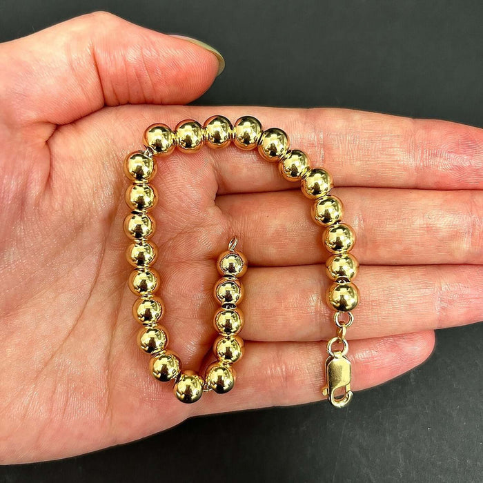18K Yellow Gold Over Sterling Silver 7mm Graduated Beaded Ball Bracelet (Hollow) 7" - WJD Exclusives