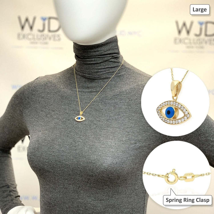 Yellow gold evil eye pendant necklace displayed on a mannequin wearing a grey turtleneck, featuring a blue eye design.