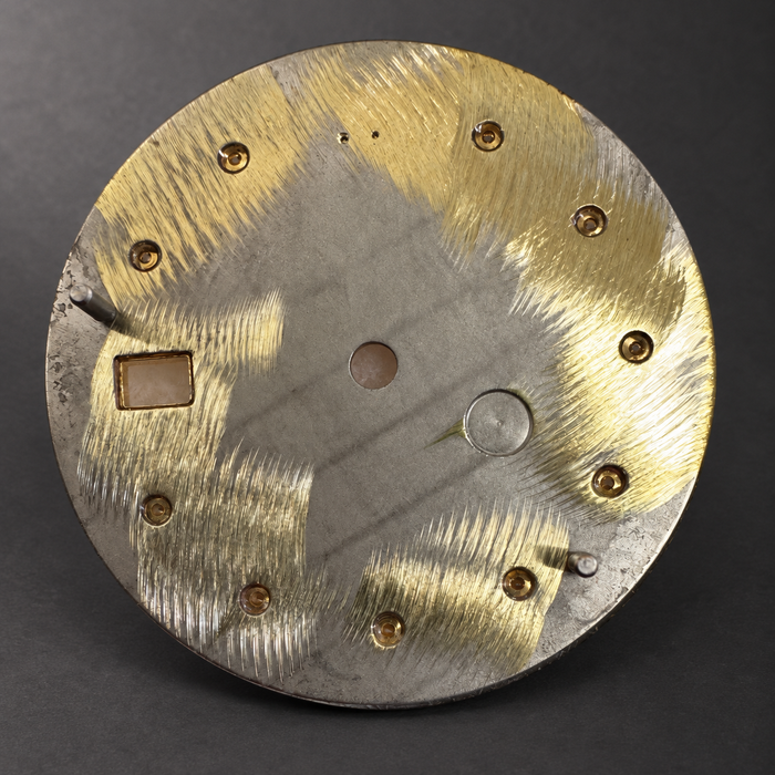 Refinished dial, reverse view