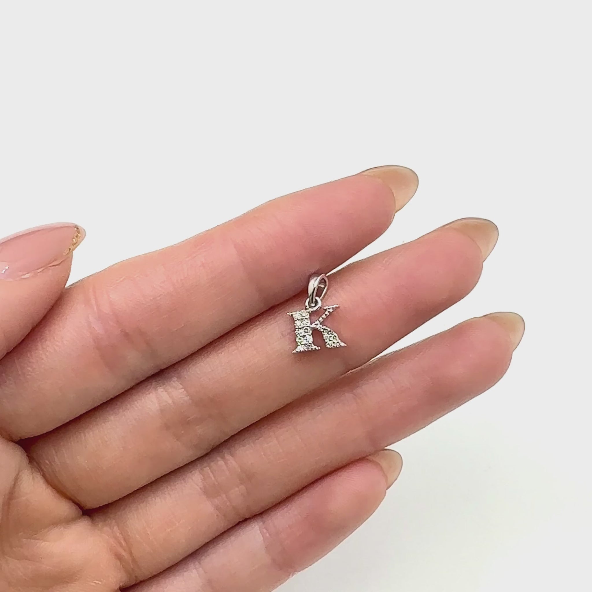 .05CTW Natural Diamond 10K White Gold Initial Letter Pendant — product video